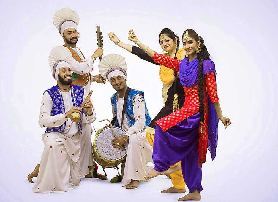Punjabi Bhangra dancers folk performance